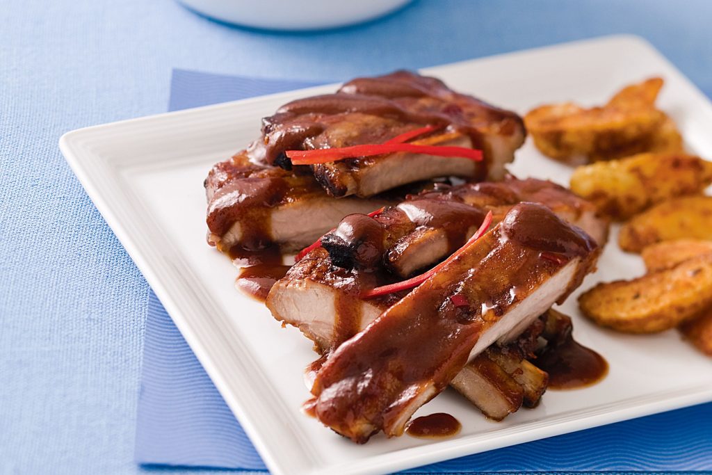 Smoky Baby Back Ribs with BBQ Glaze
This dish is often served as part of backyard BBQ meals or summer gatherings where easy, filling food is needed. It works well for cookouts and lunch-style meals, especially when served in soft buns with BBQ sauce and simple toppings like coleslaw.

Smoky Baby Back Ribs with BBQ Glaze