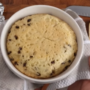 The image shows spotted dick ready to serve