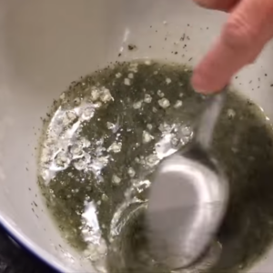 The image shows the preparing mix to coat oyster crackers