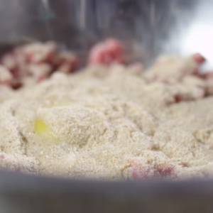 The image shows the process of making mixture for irish sausage rolls