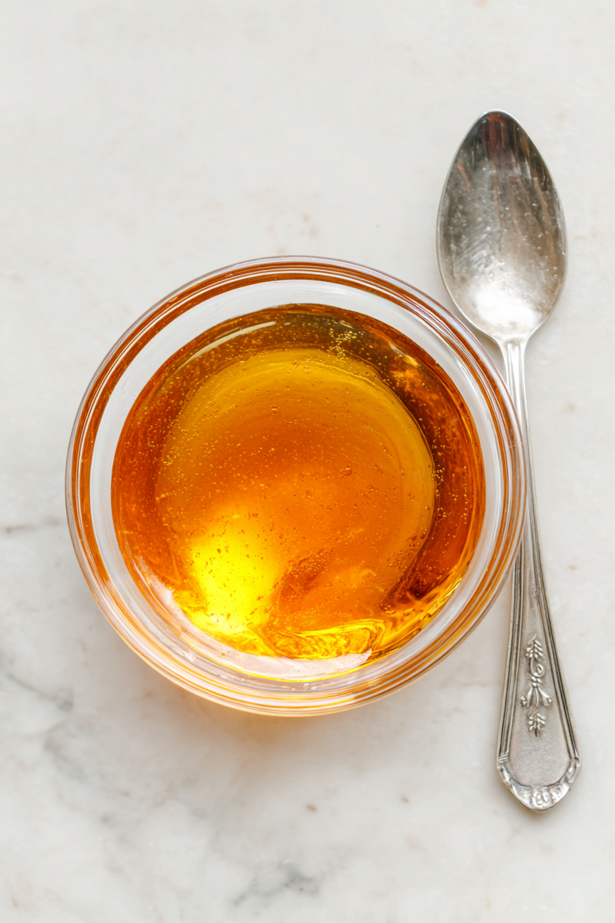Prepare Honey Syrup: Combine equal parts honey and water (e.g., 2 tablespoons each) in a microwave-safe bowl or small saucepan. Warm until honey dissolves. Set aside.