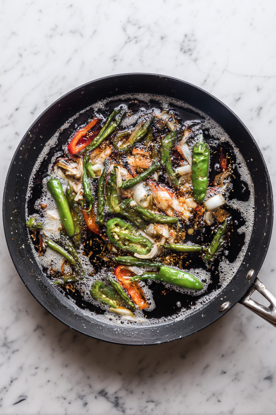 Add water, cover, and cook for 8 minutes until veggies are soft.