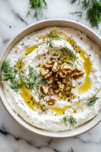 the imaage shows labneh dip is ready to serve.