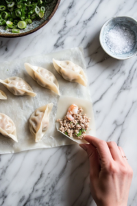 the image show to Place 1-2 teaspoons of the filling onto each wonton wrapper.