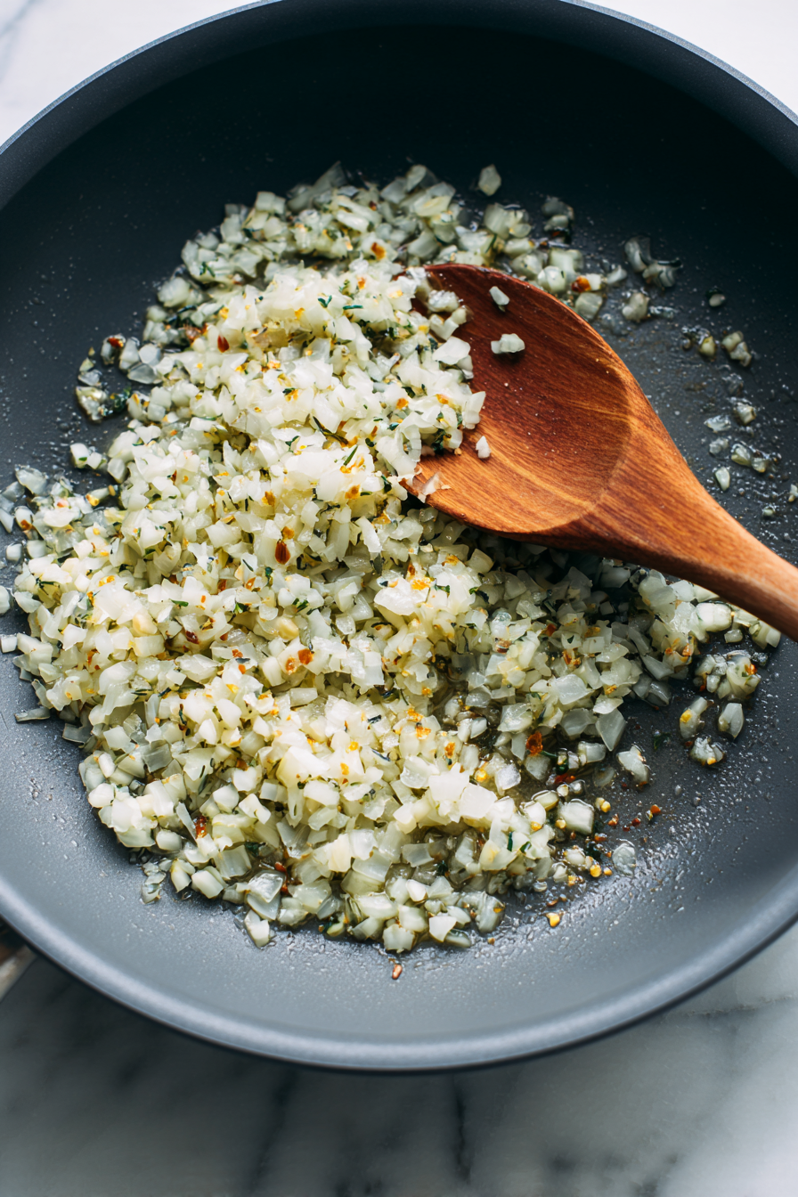Add minced garlic and diced onion