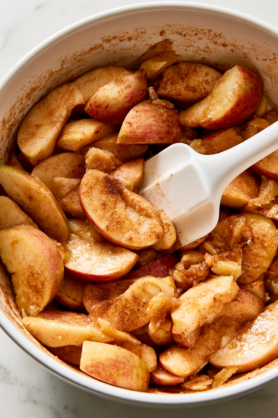 For the filling, mix apples, brown sugar, flour, lemon juice, cinnamon, and nutmeg in a bowl