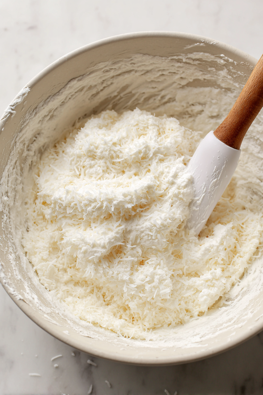 Gently fold in 1 cup of shredded coconut