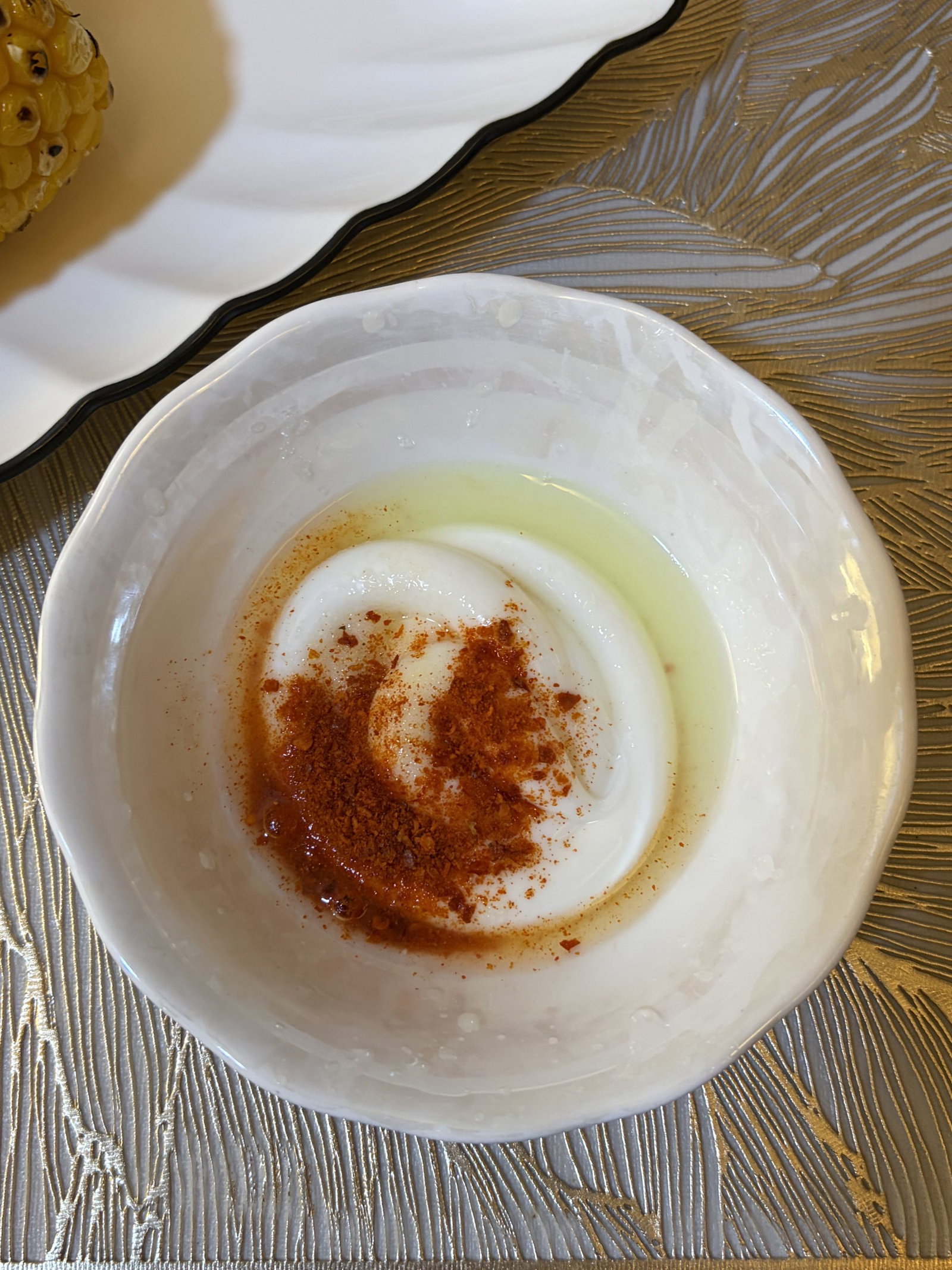 While the corn is grilling, mix the mayonnaise, lime juice, chili powder, cayenne, and salt in a small bowl until well combined.
