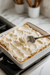 Frosting cooled Perfect Pumpkin Bars