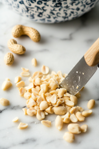 Roughly chopped unsalted peanuts for garnish in green apple salad recipe