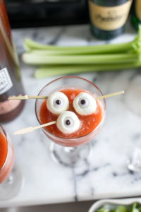 Skewering Mozzarella Eyeballs and Celery for Bloody Mary Garnish