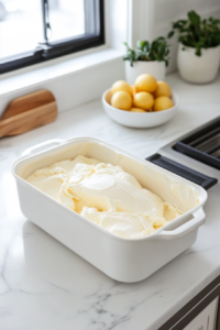 Stirring heavy cream into cooled Pumpkin Ice Cream base