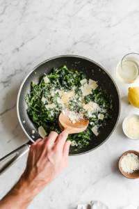 Stirring the Final Mixture for Orecchiette with Broccoli Rabe