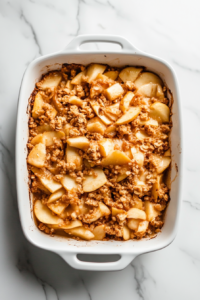 Transferring Apple Mixture into Baking Dish for Easy Apple