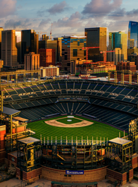  A wide-angle view of Coors Field, home to the Colorado Rockies. The image showcases the stadium's modern architecture against a clear blue sky, reflecting its status as a prominent venue for baseball games and events in Denver.