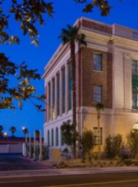 Exterior view of The Mob Museum in Las Vegas, showing its classic architecture and distinct façade, inviting visitors to explore the history of organized crime and law enforcement.