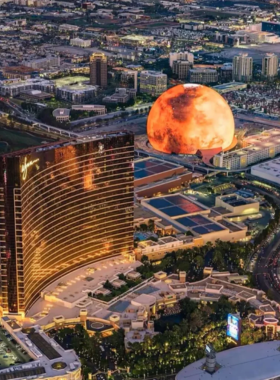 Spectacular view of the Las Vegas Sphere from a hotel room, showing the unique, illuminated architecture of the newly opened entertainment venue.

