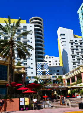 Iconic view of the Art Deco Historic District in Miami Beach, featuring pastel-colored buildings with distinctive architectural styles, representing the rich cultural heritage of the area.

