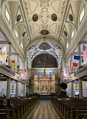 Iconic St. Louis Cathedral in New Orleans, with its towering spires and historical architecture, symbolizing the city’s deep-rooted cultural and religious heritage.