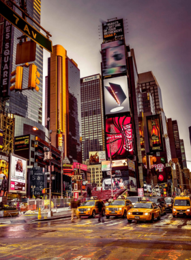 Shopping district along Fifth Avenue, New York City, known for luxury boutiques and designer stores in a bustling urban atmosphere.