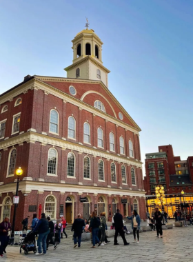 Faneuil Hall Marketplace, a historic shopping center in Boston with food stalls, shops, and street performances. This famous landmark is a lively destination for both history buffs and shoppers.