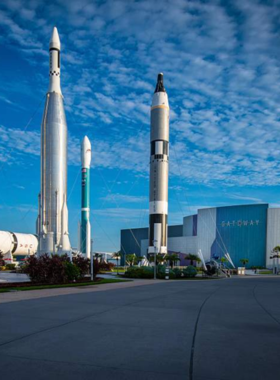  A view of the Rocket Garden at the Kennedy Space Center, displaying historic rockets from NASA’s space missions, positioned against a clear blue sky, symbolizing the milestones in U.S. space exploration.