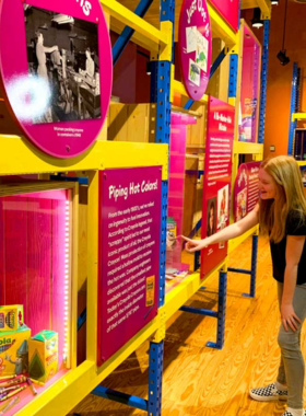 A vibrant and interactive area within the Crayola Experience, where children can explore hands-on art activities, including coloring, crafting, and other creative projects in a colorful environment.