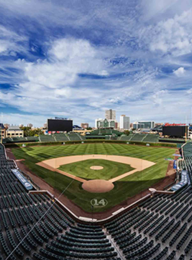 A behind-the-scenes look at the renovation of the iconic Wrigley Field in Chicago, showcasing construction work on the historic baseball stadium. The image captures the blend of modern upgrades with the classic charm of the venue, which is home to the Chicago Cubs. This renovation reflects the ongoing commitment to preserving sports heritage while enhancing the fan experience.