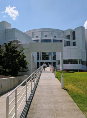 The High Museum of Art in Atlanta, an architectural marvel with white-paneled walls and large windows, housing diverse art collections from classical to contemporary works.