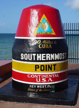 This image shows the Southernmost Point buoy in Key West, marking the southernmost point in the continental U.S. It’s a popular photo spot for tourists visiting the island, offering views of the nearby coast.