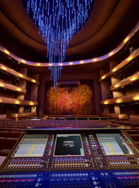  "The interior view of an auditorium at the AT&T Performing Arts Center in Dallas, Texas, showing professional stage lighting and sound equipment setup."