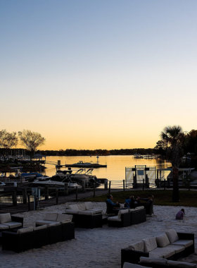 This image shows that people are enjoying outdoor recreation activities on Lake Norman, including boating and fishing, while soaking in the scenic views of North Carolina’s largest lake.