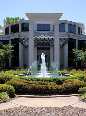 This image shows that visitors are exploring the Charlotte Museum of History, where they are learning about the city's rich past through historical exhibits that depict its growth and cultural evolution.

