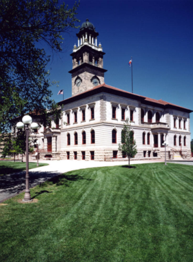 This image shows an exhibit at the Colorado Springs Pioneers Museum, featuring historical artifacts from the city's early days and its development.