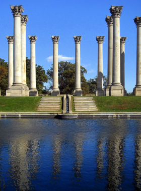 This image shows the peaceful gardens of the U.S. National Arboretum, featuring seasonal flowers and scenic natural paths.