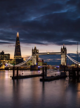 This image shows Tower Bridge over the River Thames, a symbol of London with its Victorian architecture.