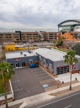 This image shows that Downtown Phoenix has a modern skyline with vibrant buildings, street art, and cultural spots, representing the city's blend of history and modernity.