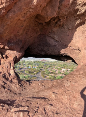 This image shows that Hole-in-the-Rock offers a perfect spot to enjoy Arizona’s vibrant sunsets over the desert landscape.