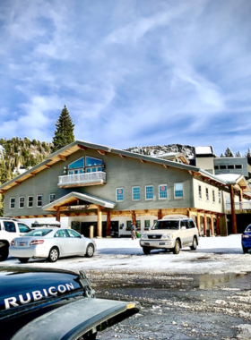 "This image shows that Brighton Resort features snowy slopes perfect for skiing, with beautiful mountain views."