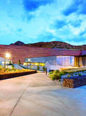 "This image shows that the Natural History Museum of Utah displays dinosaur fossils with interactive and educational exhibits."