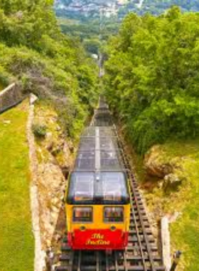 his image shows the Lookout Mountain Incline Railway, one of the world’s steepest railways. Visitors can see a train car ascending the mountain, offering scenic city views.
