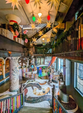  "This image shows climbing structures at City Museum, an indoor and outdoor adventure playground for all ages. Visitors can explore tunnels, slides, and artistic installations, offering a unique, creative space for exploration and fun."