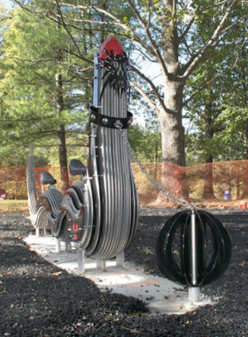 "This image shows a large outdoor sculpture surrounded by trees and green space at Laumeier Sculpture Park. The blend of art and nature provides a peaceful environment where visitors can explore unique sculptures in an open-air setting."