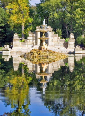 "This image shows a Victorian pavilion in Tower Grove Park, with flower gardens and shaded picnic areas around it. The historic design and lush setting make it an ideal spot for leisurely strolls, family gatherings, and photography."