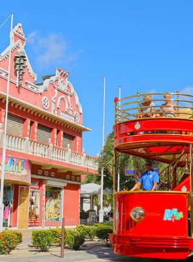 This image shows that downtown Oranjestad in Aruba is full of colorful Dutch colonial buildings and lively markets, making it a vibrant place to explore the island's culture and history.