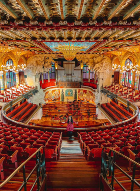 This image shows Palau de la Música Catalana in Barcelona, a beautiful concert hall known for its ornate design, stained glass, and vibrant, intricate decorations.