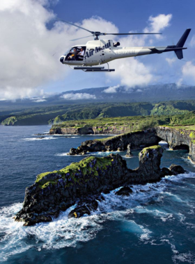  This image shows breathtaking aerial views of Maui’s cliffs, waterfalls, and lush landscapes captured during a helicopter tour.