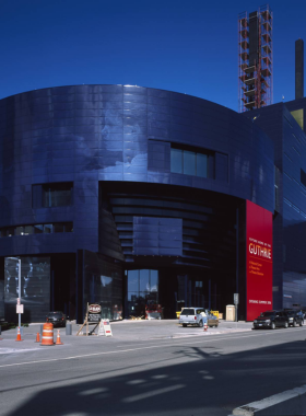 This image shows that the Guthrie Theater in Minneapolis is known for its groundbreaking theater productions and distinctive architecture, offering visitors a premier cultural experience.

