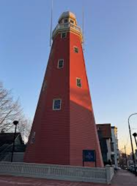 This image shows the Portland Observatory, a historic maritime signal tower providing sweeping views of the city and Casco Bay from its elevated platform.