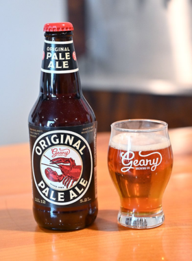 This image shows a group of visitors enjoying a tasting session of local craft beer at one of Portland’s famous breweries, sampling various styles of beer.
